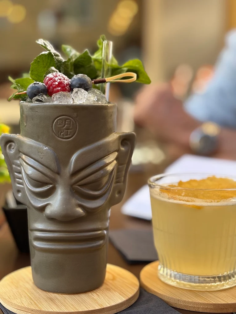 Kontiki cocktail in carved tiki mug